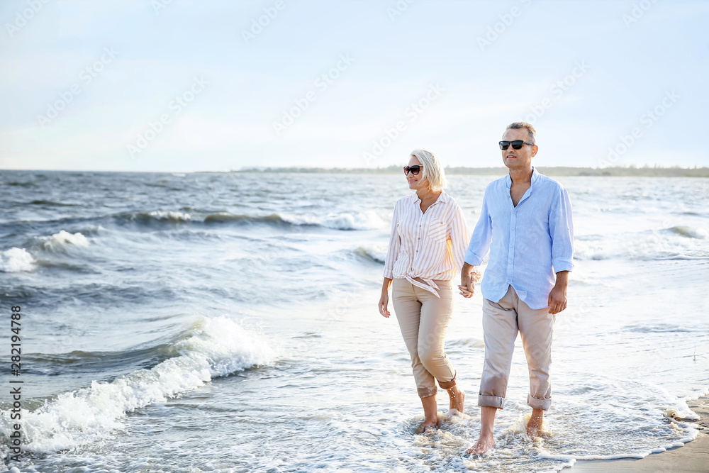 Happy mature couple at sea resort