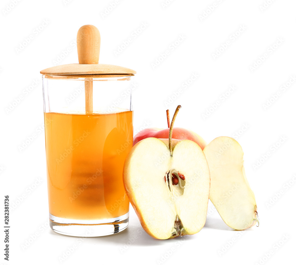 Fresh honey and apples on white background