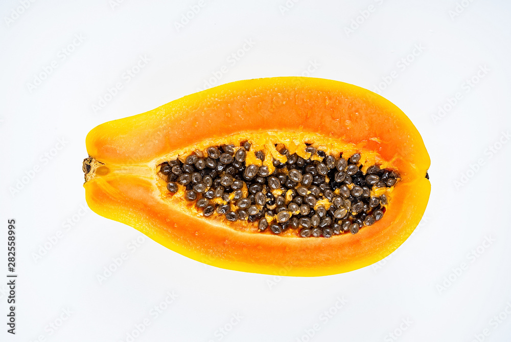 Papaya cut from a fresh fruit on a white background