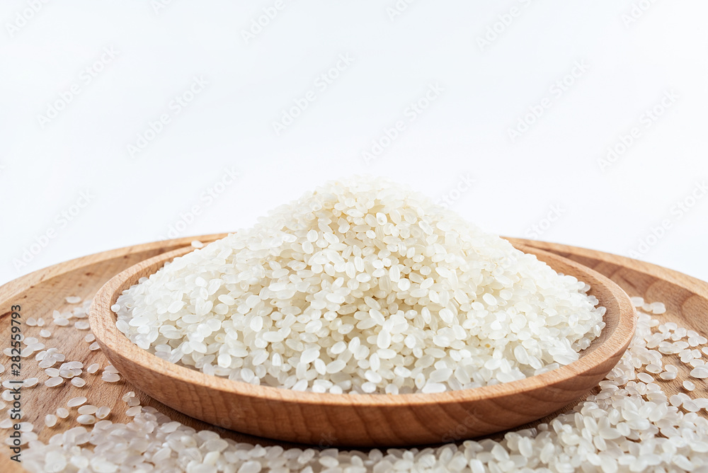 A dish of Chinese northeast rice round rice on a white background