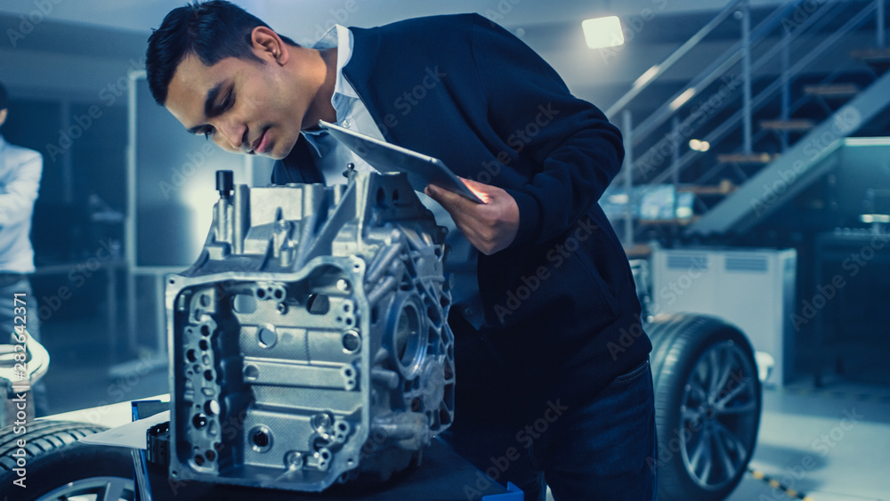 Development Laboratory Room with Professional Automotive Design Engineer Working on a Electric Car G