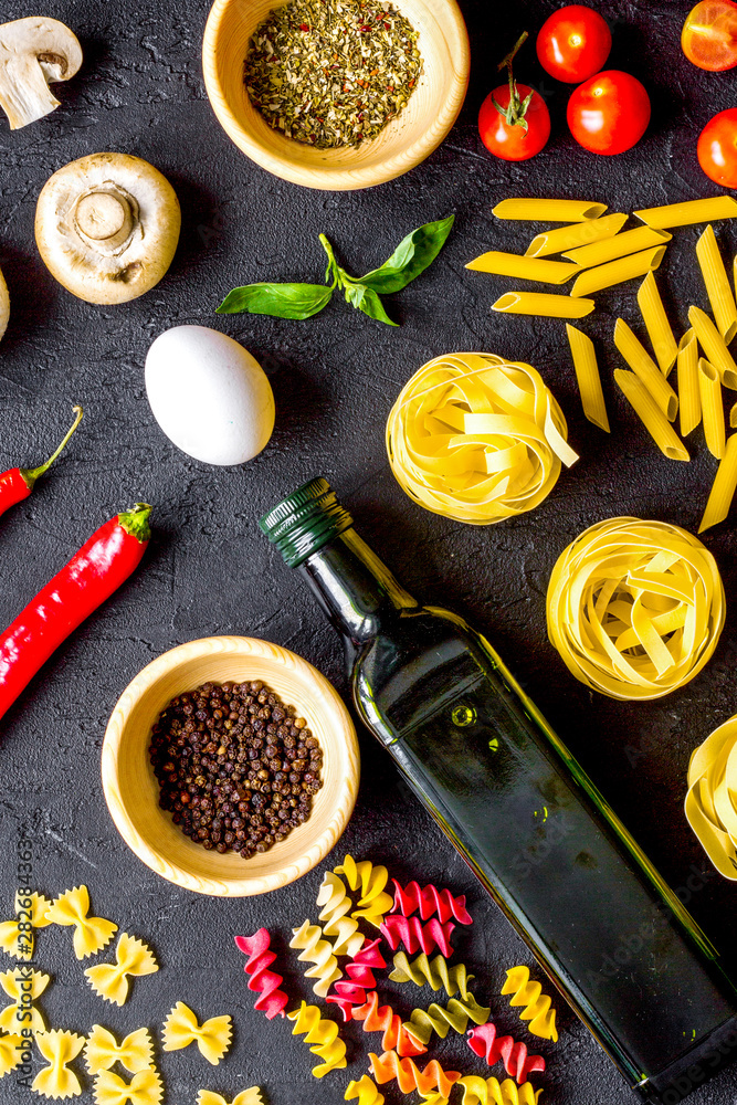 ingredients for cooking paste on dark background top view