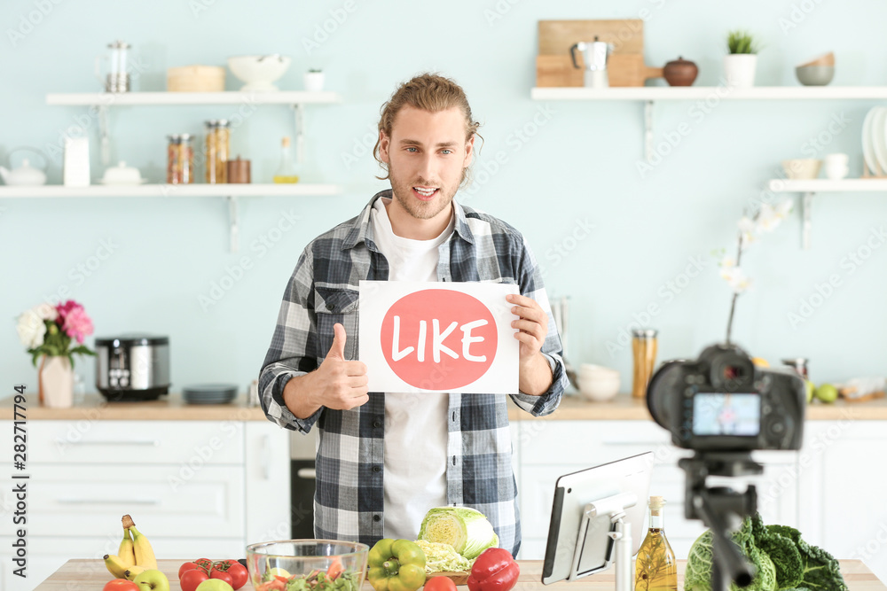 Food blogger recording video at home