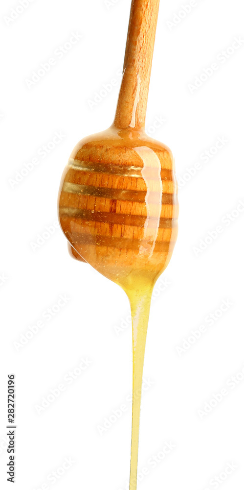 Wooden honey dipper on white background