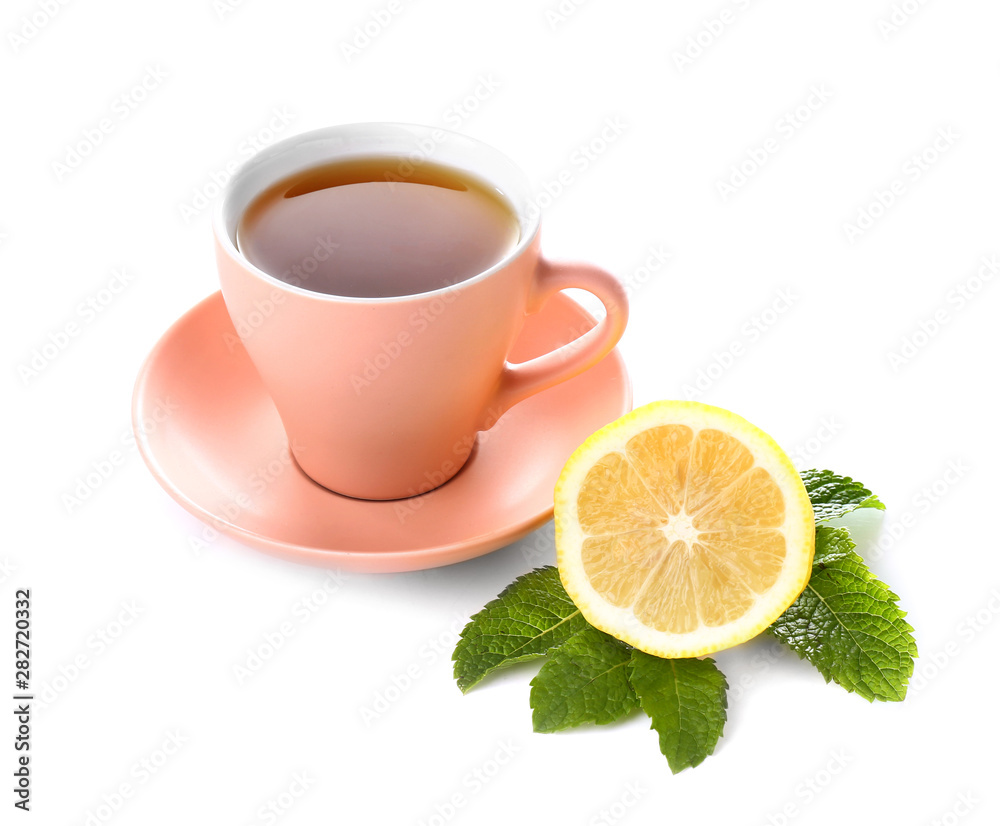 Cup of hot tea with lemon on white background