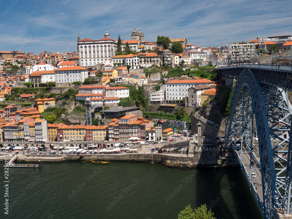 Portugal, may 2019: Scenic view of the Porto Old Town pier architecture over Duoro river in Porto