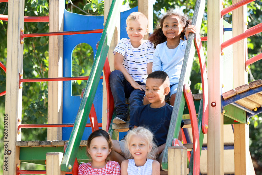 Cute little children on playground outdoors