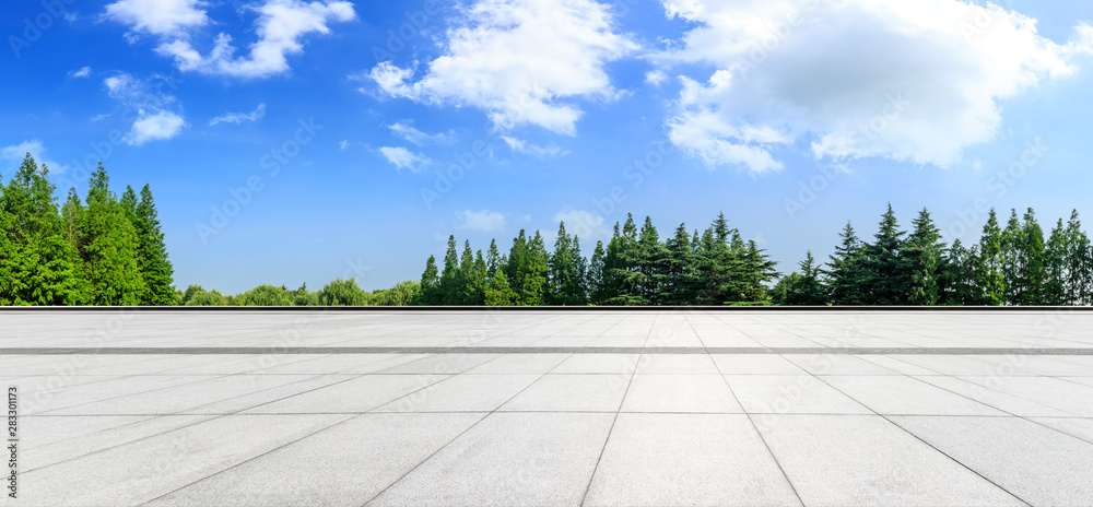 Empty square floor and green woods natural scenery in city park