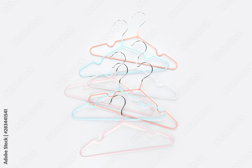 Clothes hangers on white background