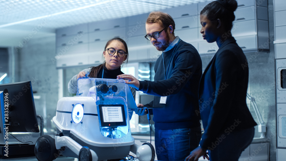 Multi Ethnic Team of Male and Female Leading Scientists Work on Innovative Robotics Technology. They