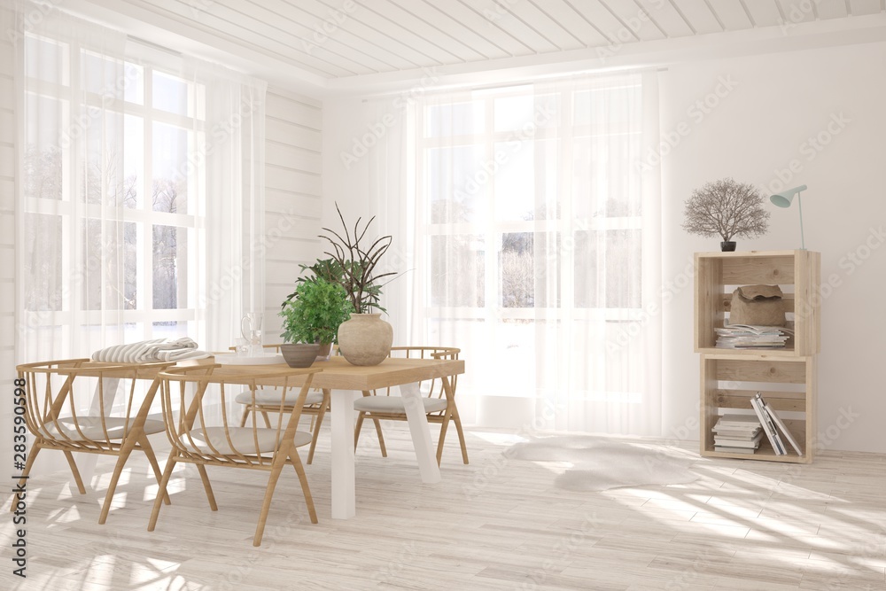 White stylish minimalist dinner room with winter landscape in window. Scandinavian interior design. 