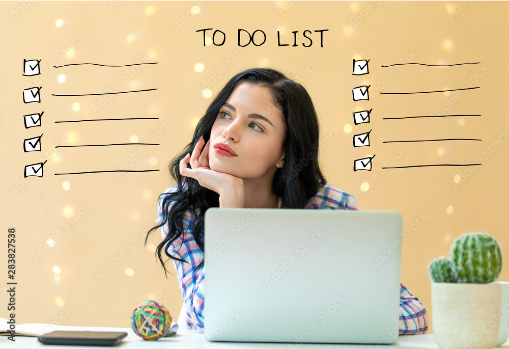 To do list with young woman using a laptop