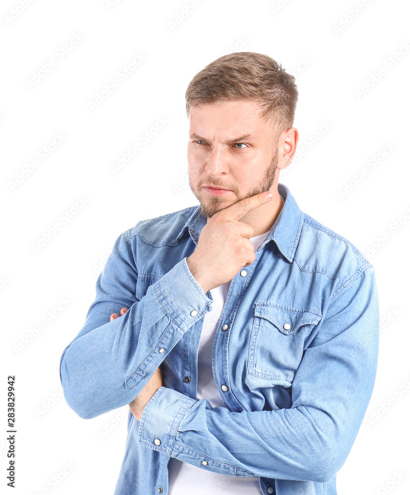 Thoughtful young man on white background