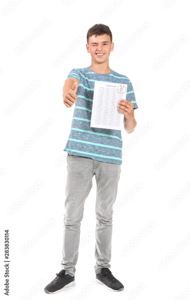 Happy boy with results of school test on white background