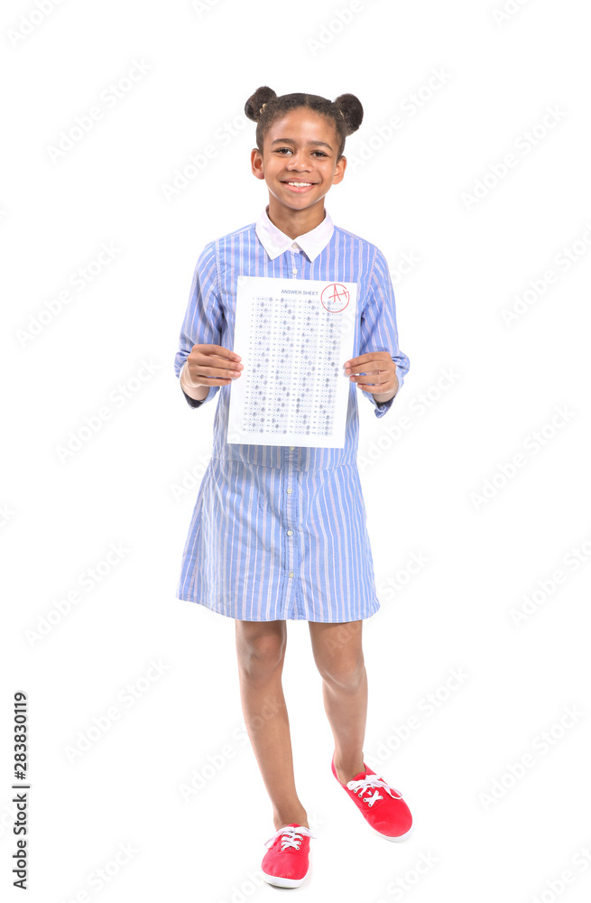 Happy African-American girl with results of school test on white background