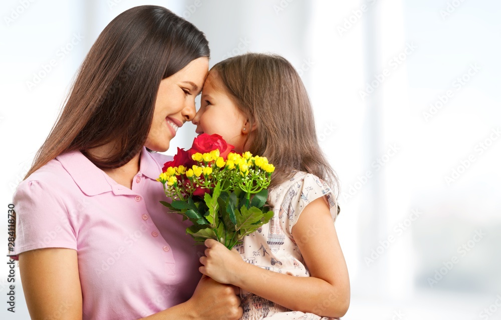 Happy Mother and daughter hugging