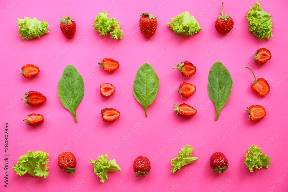 Fresh strawberry with herbs on color background