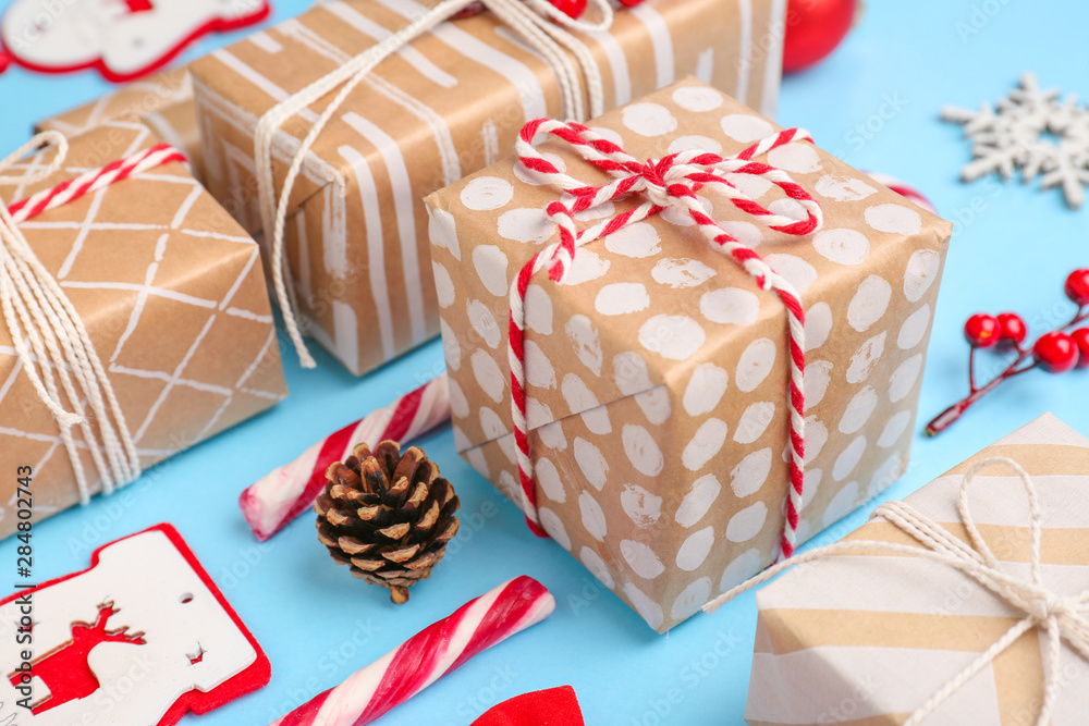 Christmas gift boxes on color background