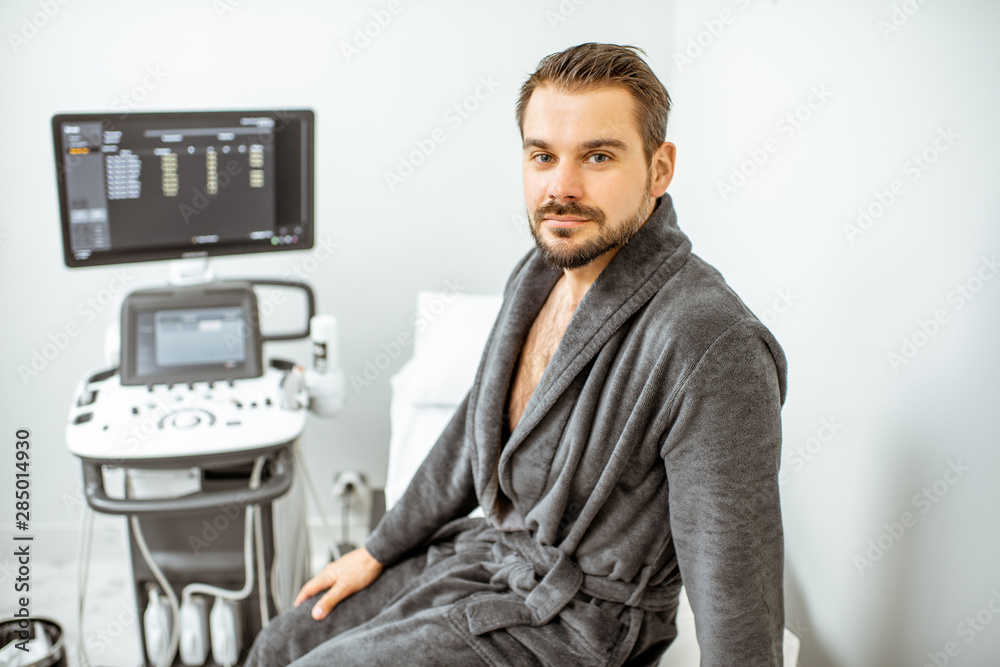 Man at the medical office with ultarsound diagnostics