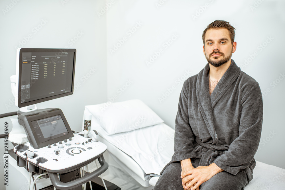 Man at the medical office with ultarsound diagnostics