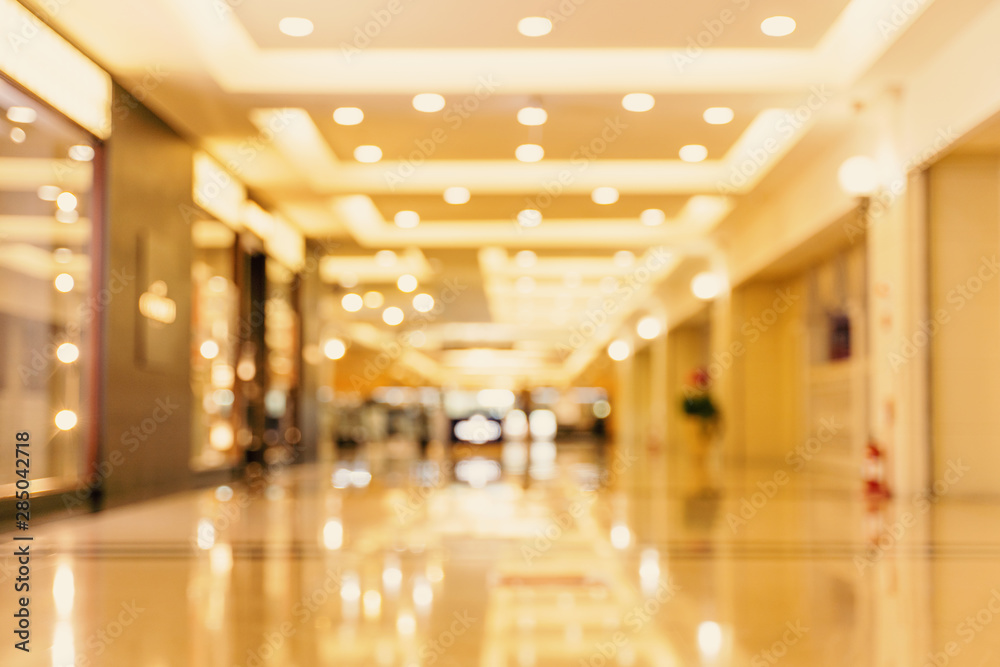 Luxury department store shopping mall interior, abstract defocused blur with bokeh background, conce