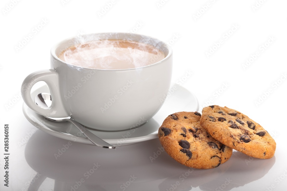 Cup of tea with cookies over  background