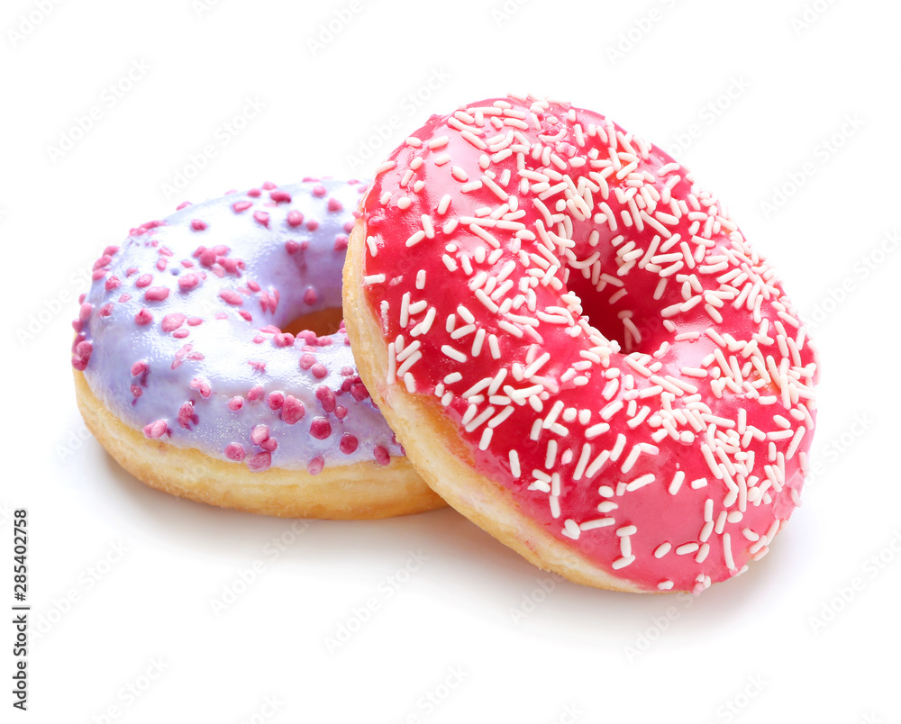 Sweet tasty donuts on white background