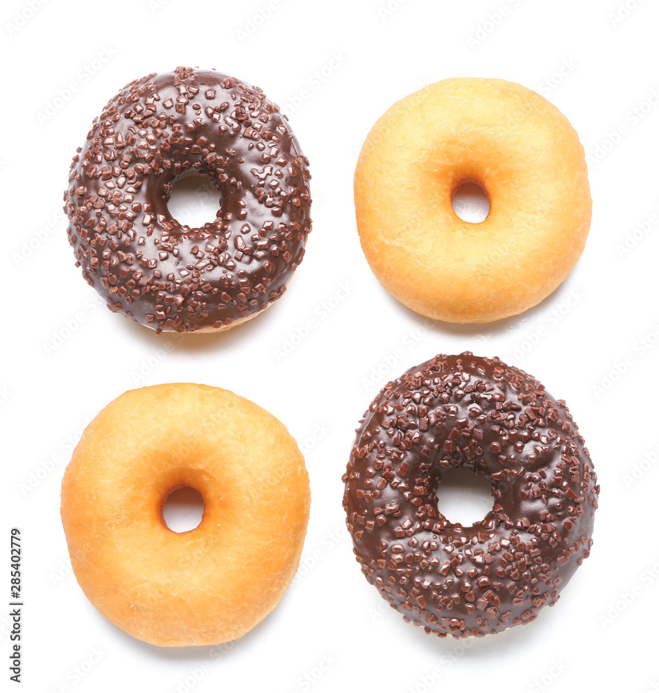 Sweet tasty donuts on white background