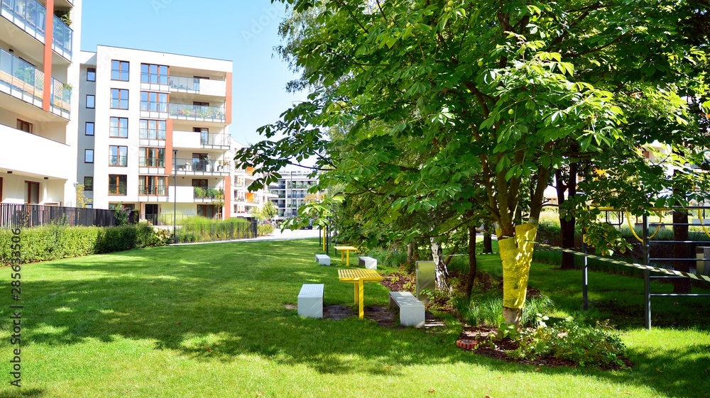 Contemporary residential building exterior in the daylight. Modern apartment buildings on a sunny da