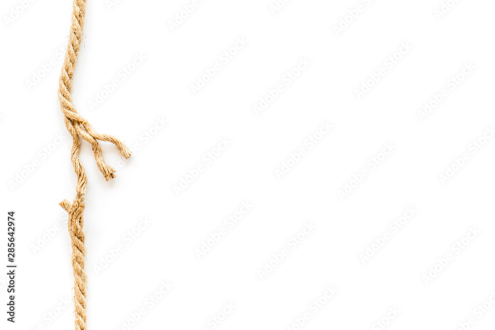 risk concept with rope near to break on white background top view space for text