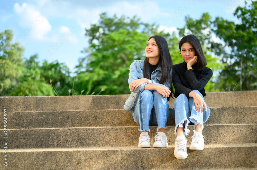 Female student model sitting at university