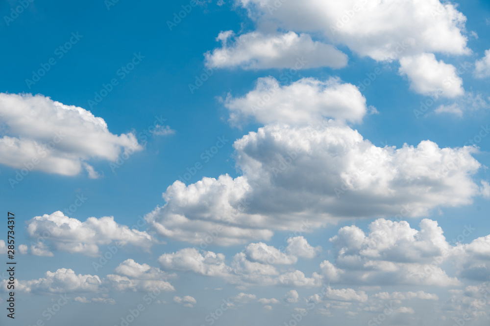 Blue sky and white clouds under the sun