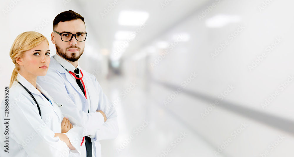 Doctor working with another doctor in the hospital. Healthcare and medical service.