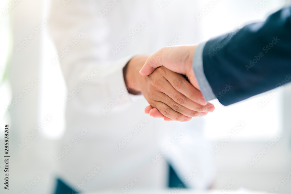 business successful contract agreement two businessman handshake with confident and powerful mission