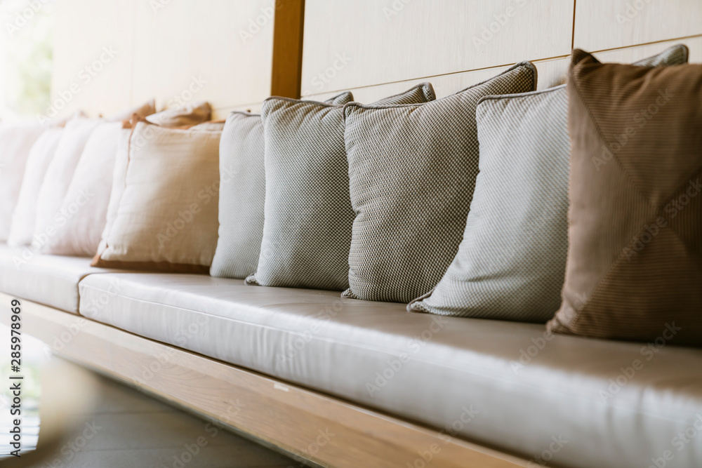 close up white beige soft pillows on bed and blanket bedroom interior design concept.bed maid luxury