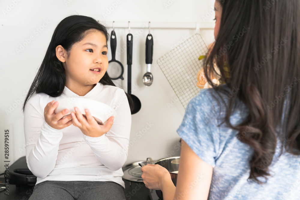 happiness asian family mom and daughter cooking together in kitchen home sweet home ideas concept