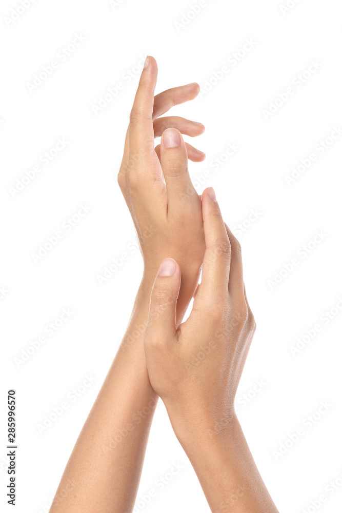 Beautiful female hands on white background