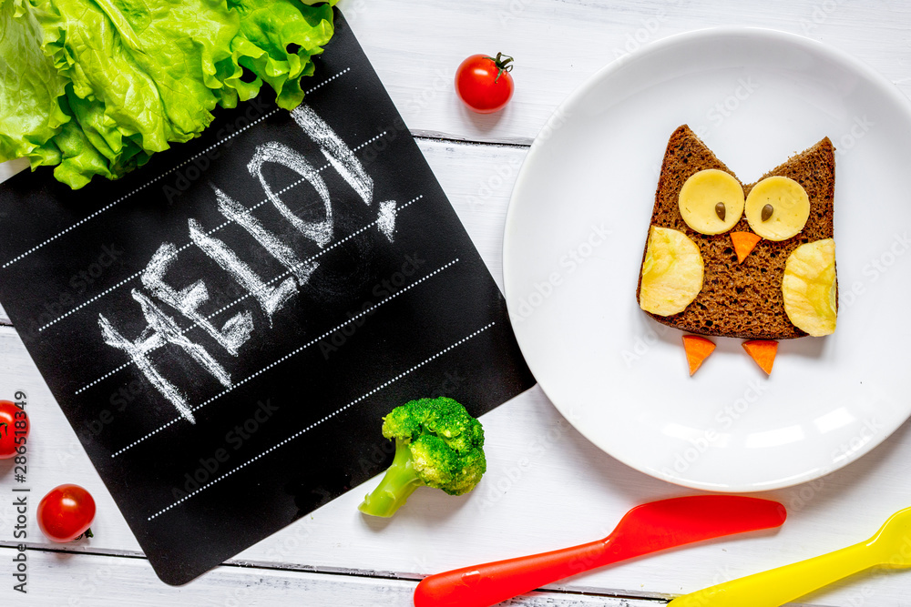 kids menu owl shaped sandwich hello top view