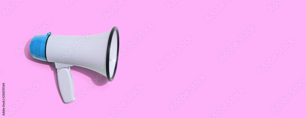 White megaphone with hard shadow overhead view