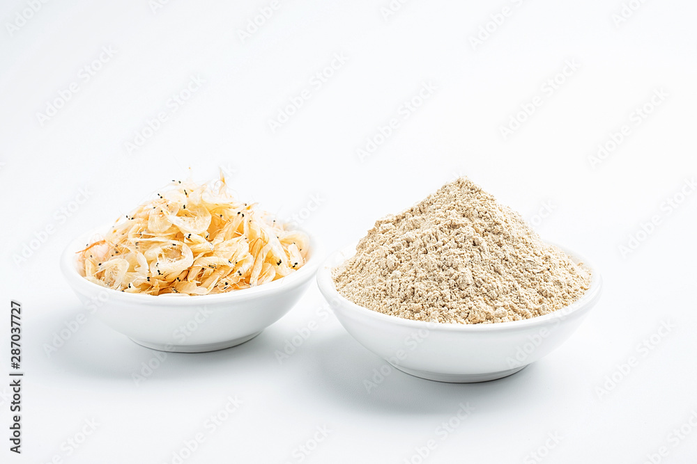 Dried seafood white shrimp and shrimp skin powder on white background