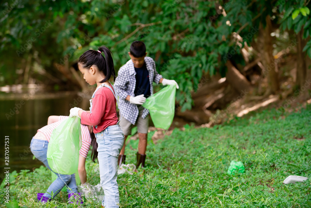 Asian group of kids volunteer charity environment , Ecology cleaning green concept