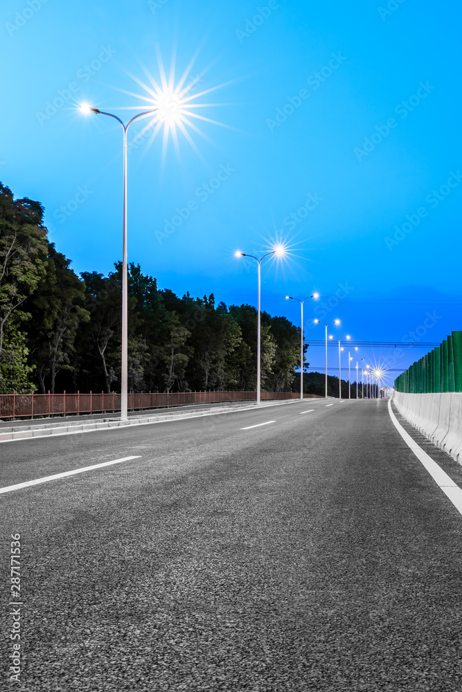 New city road and bright street lights at night