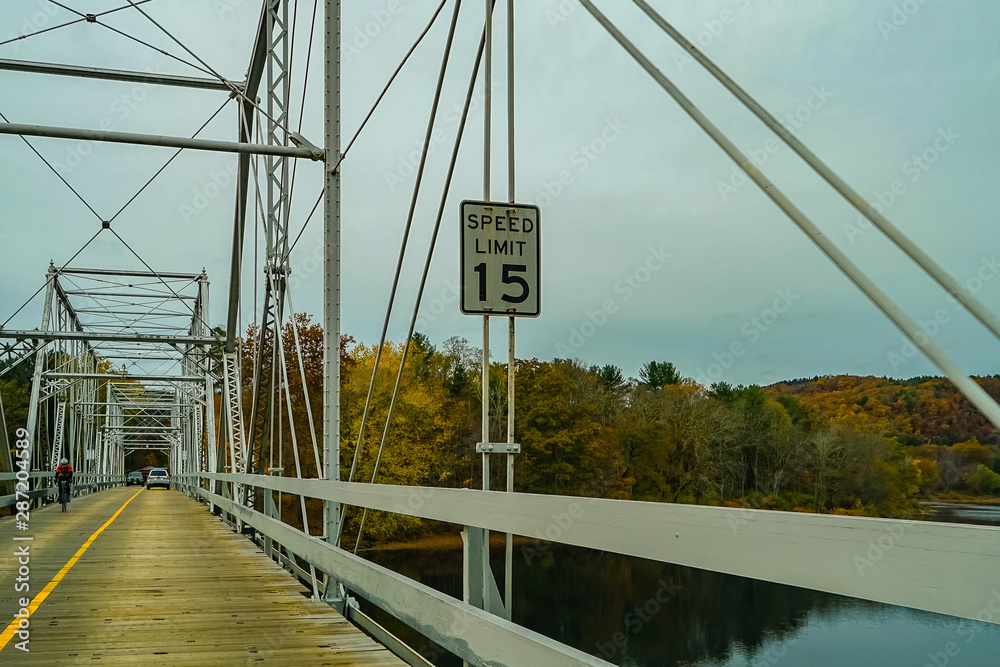 Dingmans Ferry Bridge across the Delaware River in the Poconos Mountains, connecting the states of P