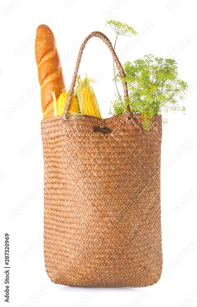 Stylish eco bag with fresh products on white background