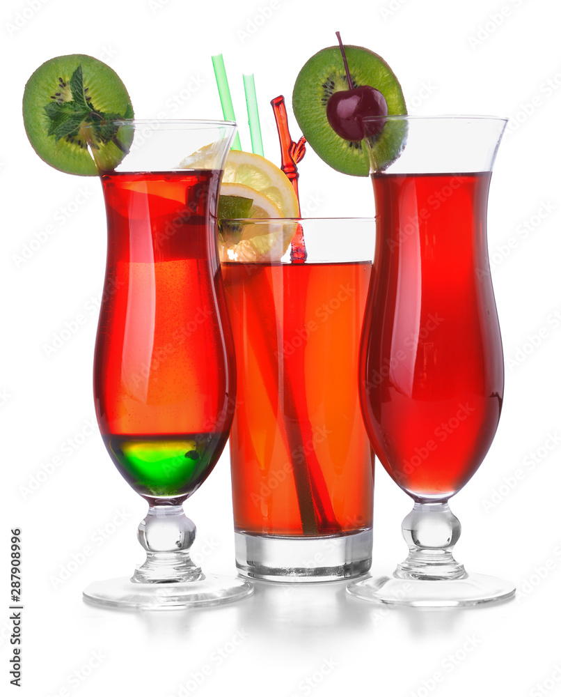 Different cocktails in glasses on white background