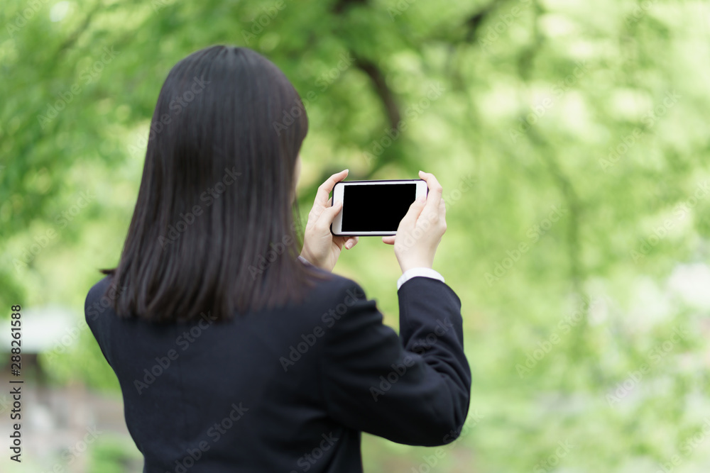 女子高生　スマートフォン