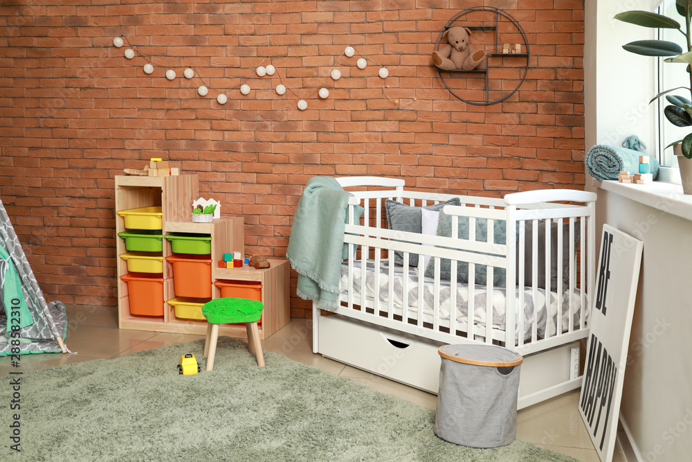 Interior of modern baby room with crib