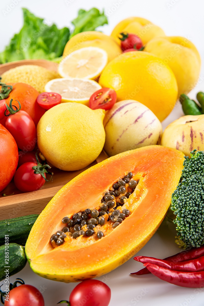 Full screen of fresh seasonal fruits and vegetables and grains of legumes