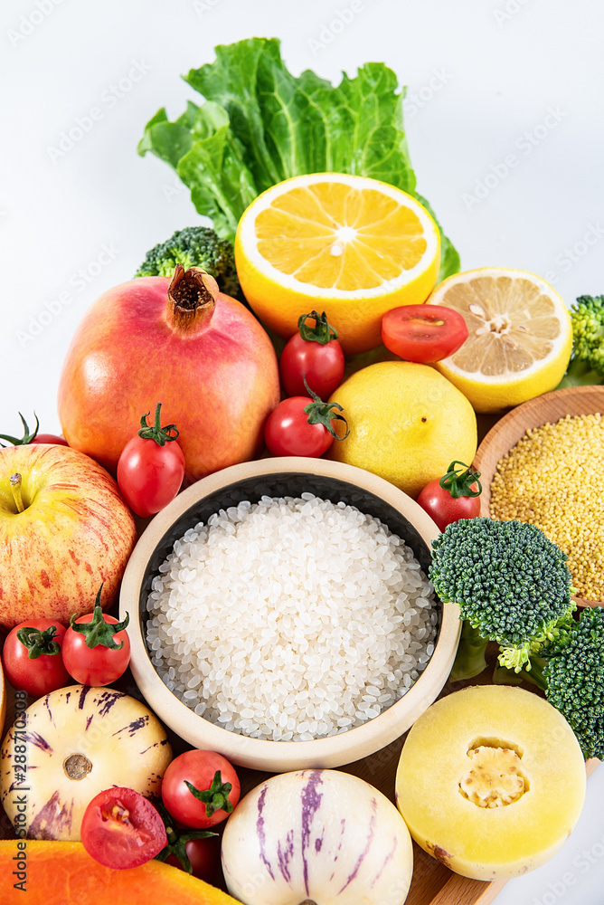 Full screen of fresh seasonal fruits and vegetables and grains of legumes