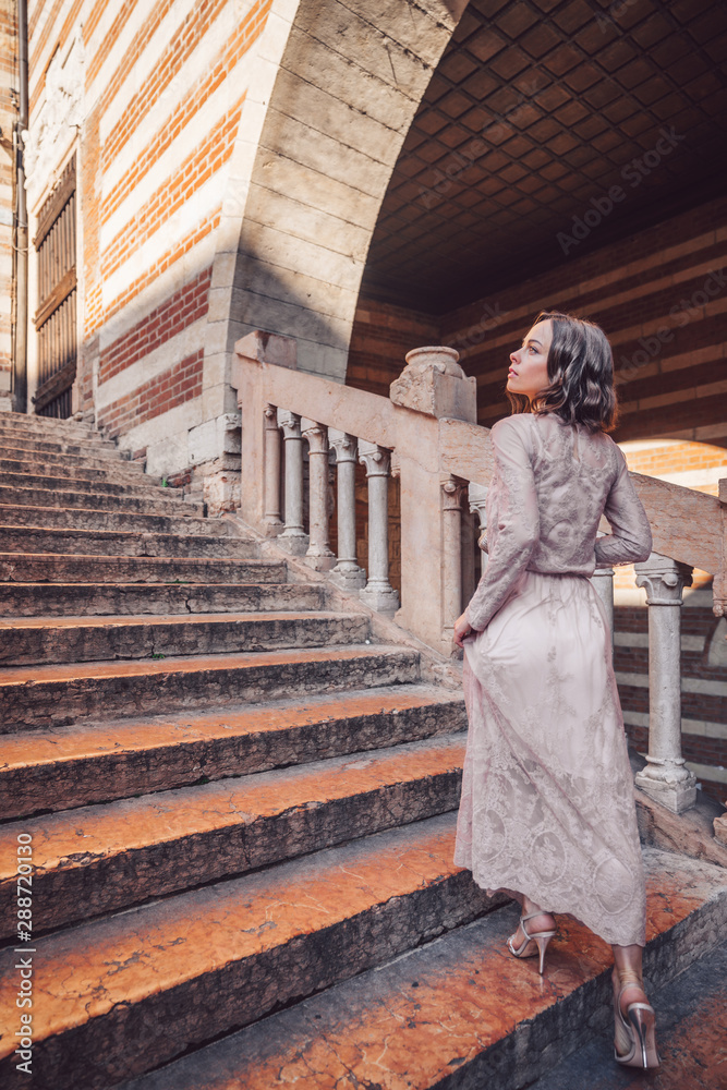 Beautiful girl in a romantic dress